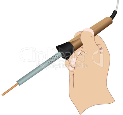 A hand with an electric soldering iron