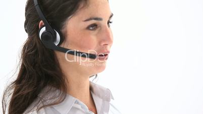 Business woman speaking into a headset
