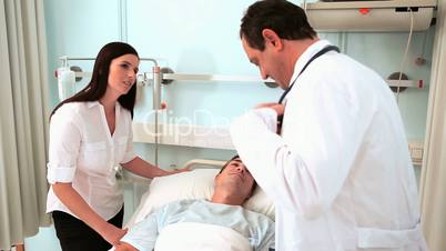 Doctor examining a patient with a stethoscope