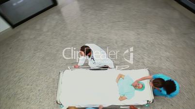 High angle view of a medical team wheeling a patient on a bed