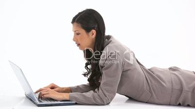 Classy woman using a laptop