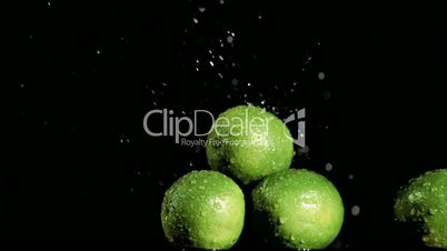 Limes in super slow motion receiving water