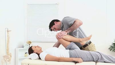 Physiotherapist working on a patient