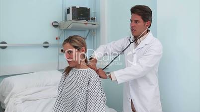 Doctor smiling to his patient