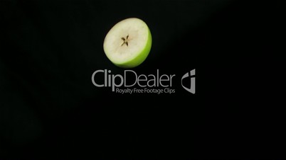 Apple half rotating in super slow motion