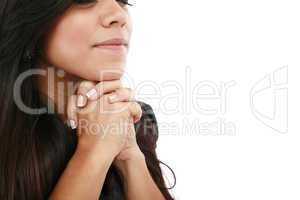 Closeup portrait of a young woman praying