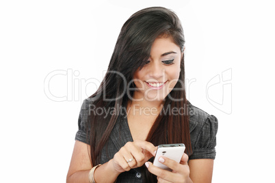 portrait of a happy young business woman texting from her cellph