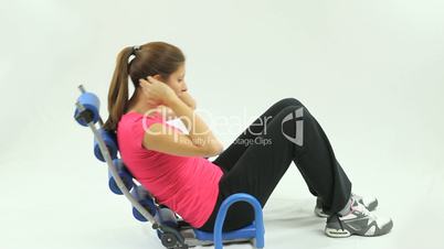 Young woman exercising sit-ups