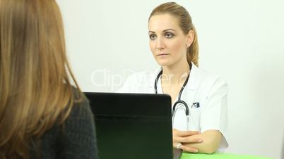 Doctor listening to a patient