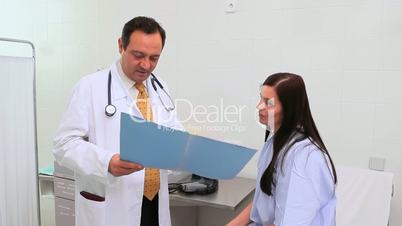 Doctor talking with a patient