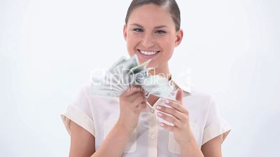 Happy woman holding banknotes