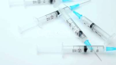 Syringe laid out together