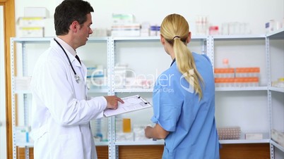 Nurse and a doctor taking drugs