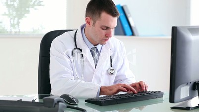 Doctor using a computer