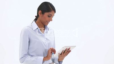 Classy woman using a tablet computer