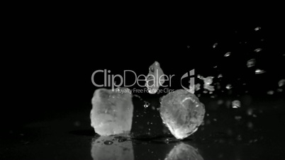 Ice cubes in super slow motion hurting each other