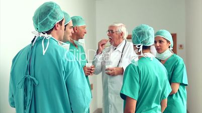 Surgery team speaking to each other