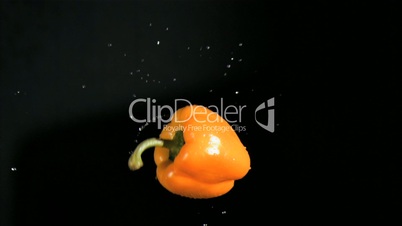 Yellow bell pepper rotating in super slow motion