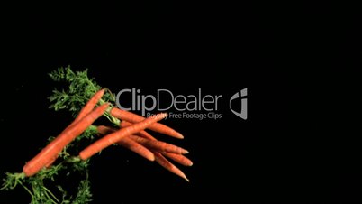 Carrots falling in super slow motion