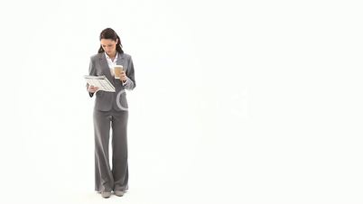 Business woman reading a newspaper