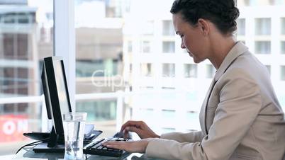 Business woman using a computer