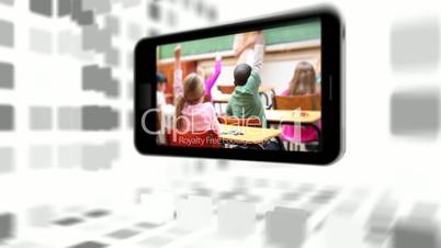 Videos of a primary classroom on a smartphone screen