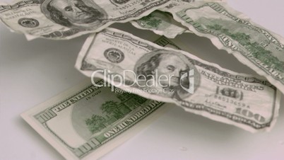 Dollar banknotes blown in super slow motion