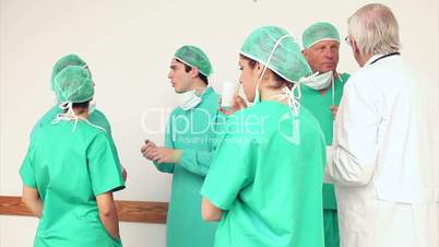 Surgery team speaking to each other