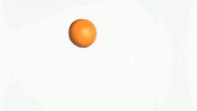 Tangerine rotating in super slow motion