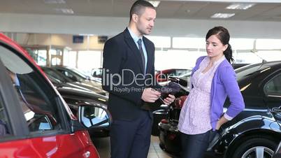 Businessman giving explication to a woman