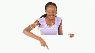 Woman showing a white board