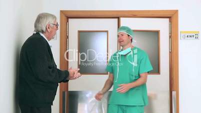Surgeon talking in the corridor