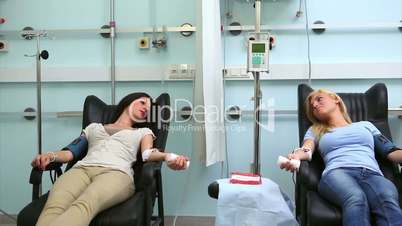 Two blood donor talking
