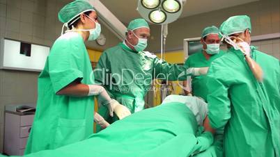 Surgical team around a patient