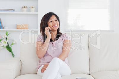 Woman smiling and ohoning