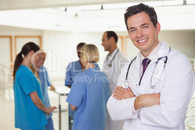 Doctor smiling in front of camera