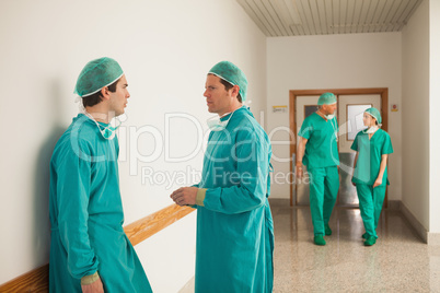 Surgeons speaking in the corridor