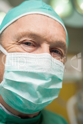 Close up of a surgeon with a facemask on