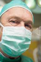 Close up of a surgeon with a facemask on