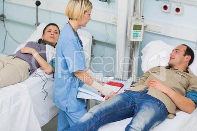 Nurse talking to a transfused patient