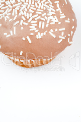 Extreme close up of a muffin with icing sugar