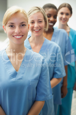 Smiling female nurses looking at camera