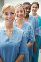 Smiling female nurses looking at camera