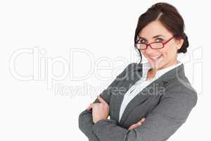 Attractive secretary with arms folded