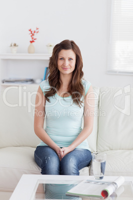 Woman sitting on a sofa