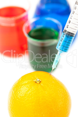 Syringe pricking a lemon