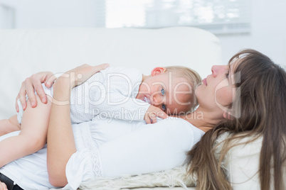 Baby lying on the chest of a mother