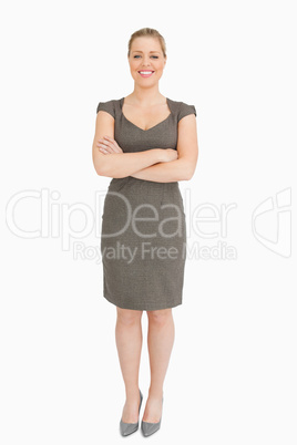 Woman smiling with arms crossed