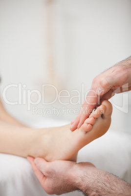 Doctor offering a foot massage