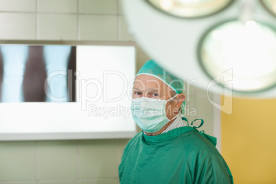 Surgeon standing next to a x-ray light